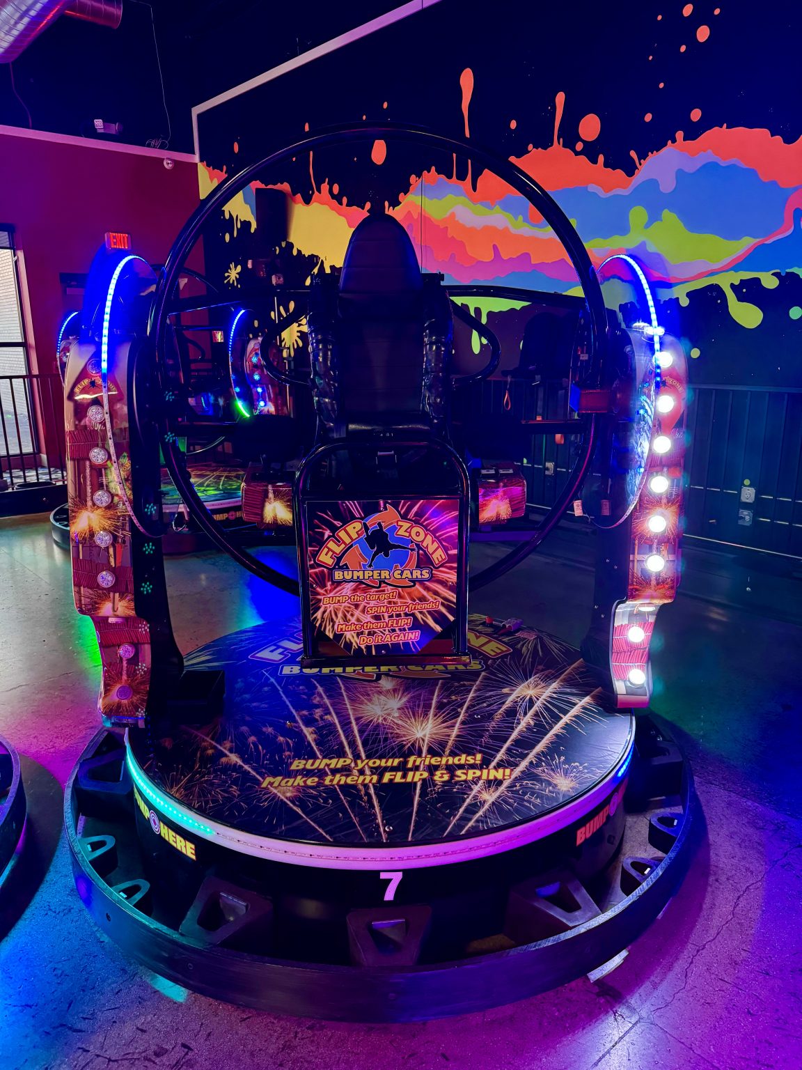 Flip Zone bumper car with neon lighting at Play and Spin entertainment center in Niles Illinois